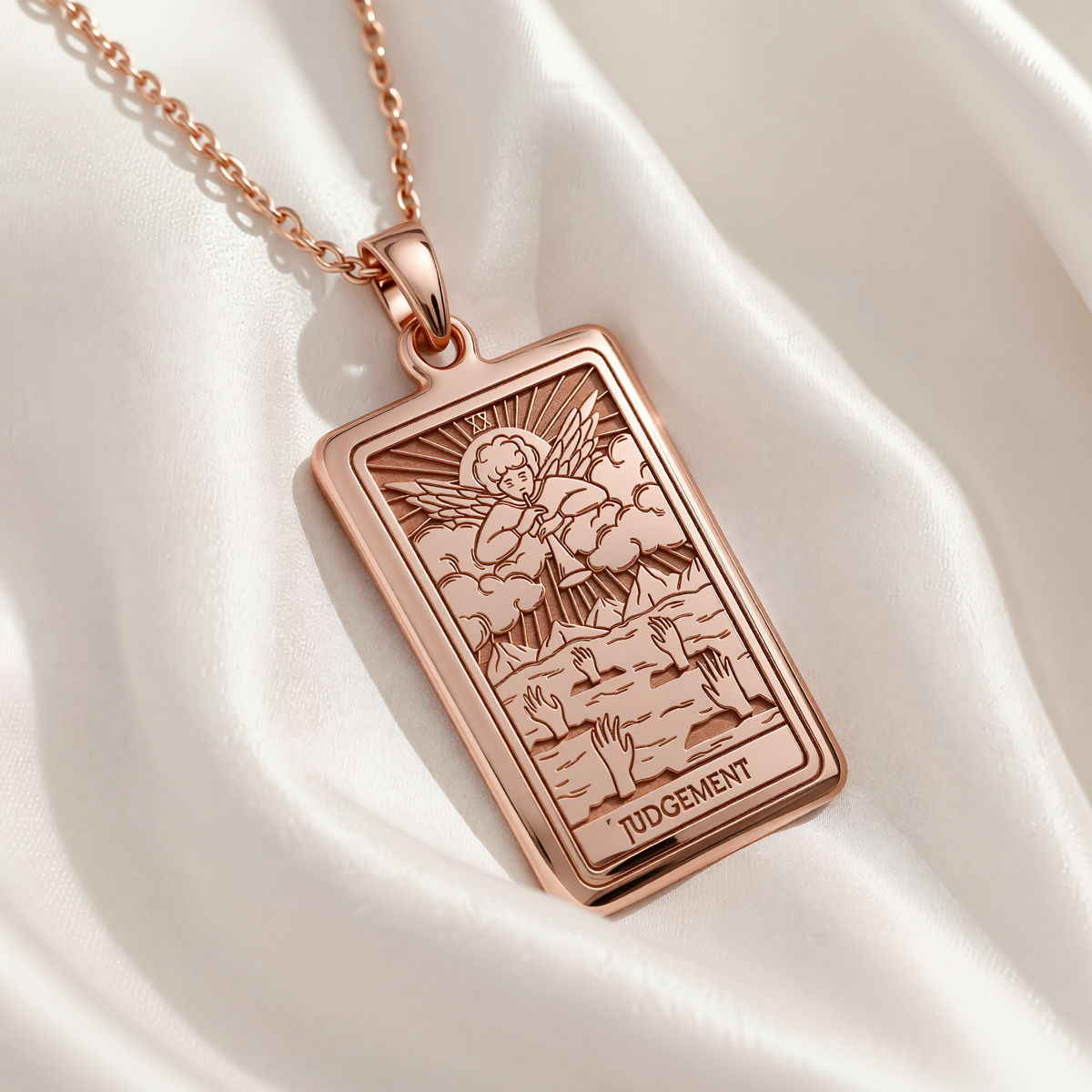 Judgement Tarot Necklace in Rose Gold Plated. Rectangular pendant shows the angel and rising hands from the Judgement card.