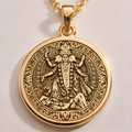 Kali Ma Memento Mori Pendant in a gold finish, shown from the front with detailed engraving on the pendant.