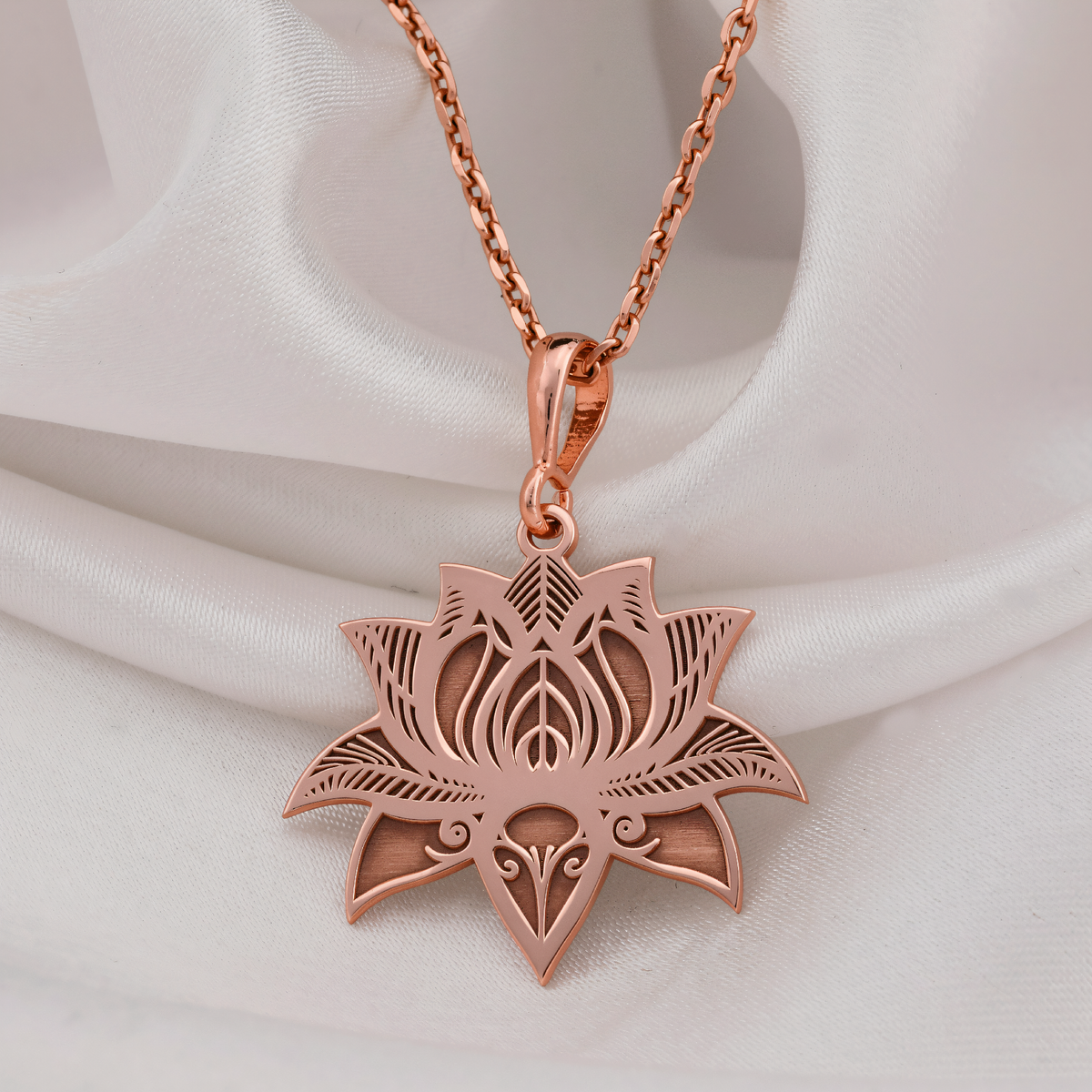 Lotus Flower Yoga Talisman Necklace in a polished rose gold finish.