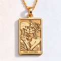 Lovers Tarot Card Necklace in a gold finish, shown from the front with detailed engraving on the pendant.