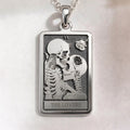Silver plated Lovers Tarot card pendant necklace. Occult astrology zodiac symbol jewelry with a polished finish.