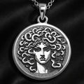 Medusa Gorgon head pendant necklace in silver. Detailed antique mythology protection talisman jewelry. Silver plated options available.