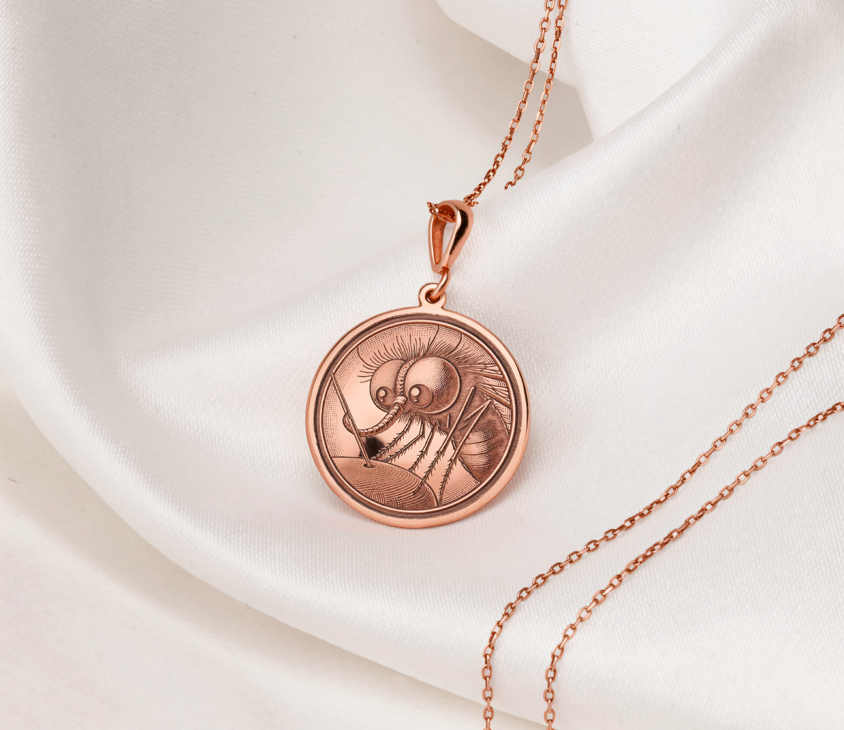 Mosquito Insect Amulet Pendant in a polished rose gold finish.