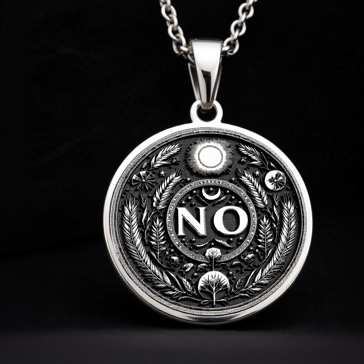 925 Sterling Silver NO Pendant with detailed boundary design. Handcrafted silver coin charm featuring empowering affirmation surrounded by protective evil eye, moon and laurel elements. Self-respect jewelry celebrating personal sovereignty.
