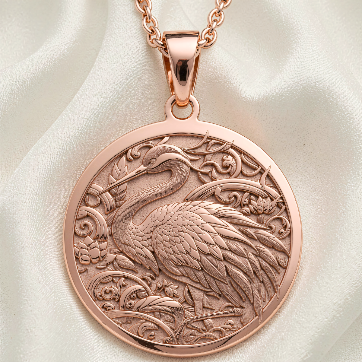 Front view of Origami Crane Necklace in Rose Gold Plated with floral and scrollwork motifs.