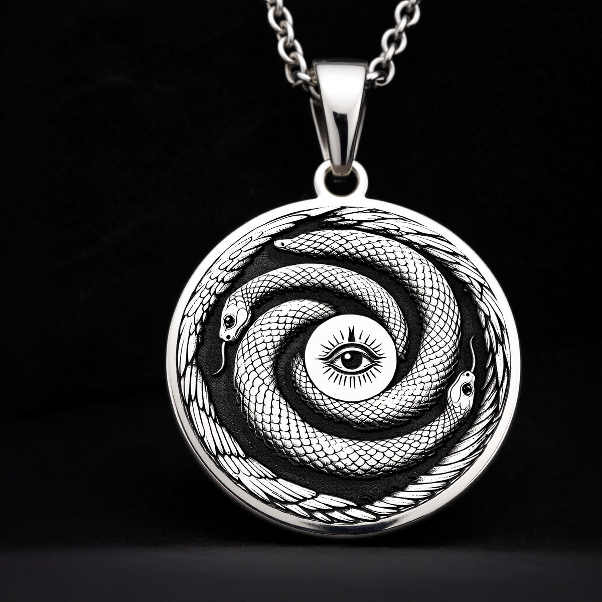 Sterling Silver Ouroboros Necklace crafted with fine details, showcasing the eternal snake symbol of rebirth and cycles. A meaningful gift or statement piece for any occasion.