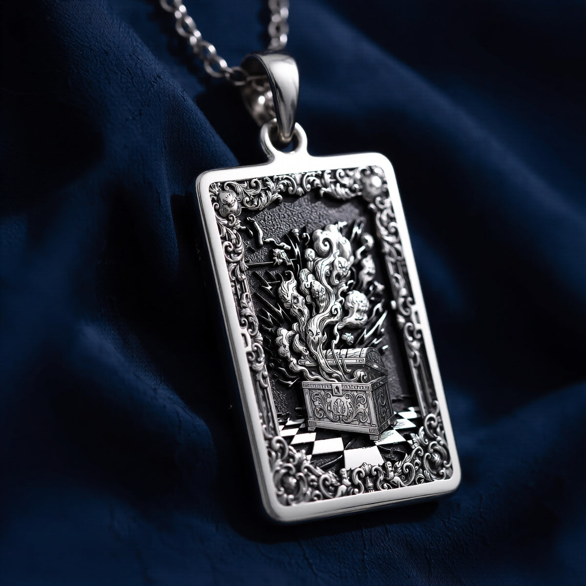 Silver pendant necklace featuring an ancient mythology hope symbol design with a detailed surface finish. The image shows a close-up view of the pendant and a portion of the chain.