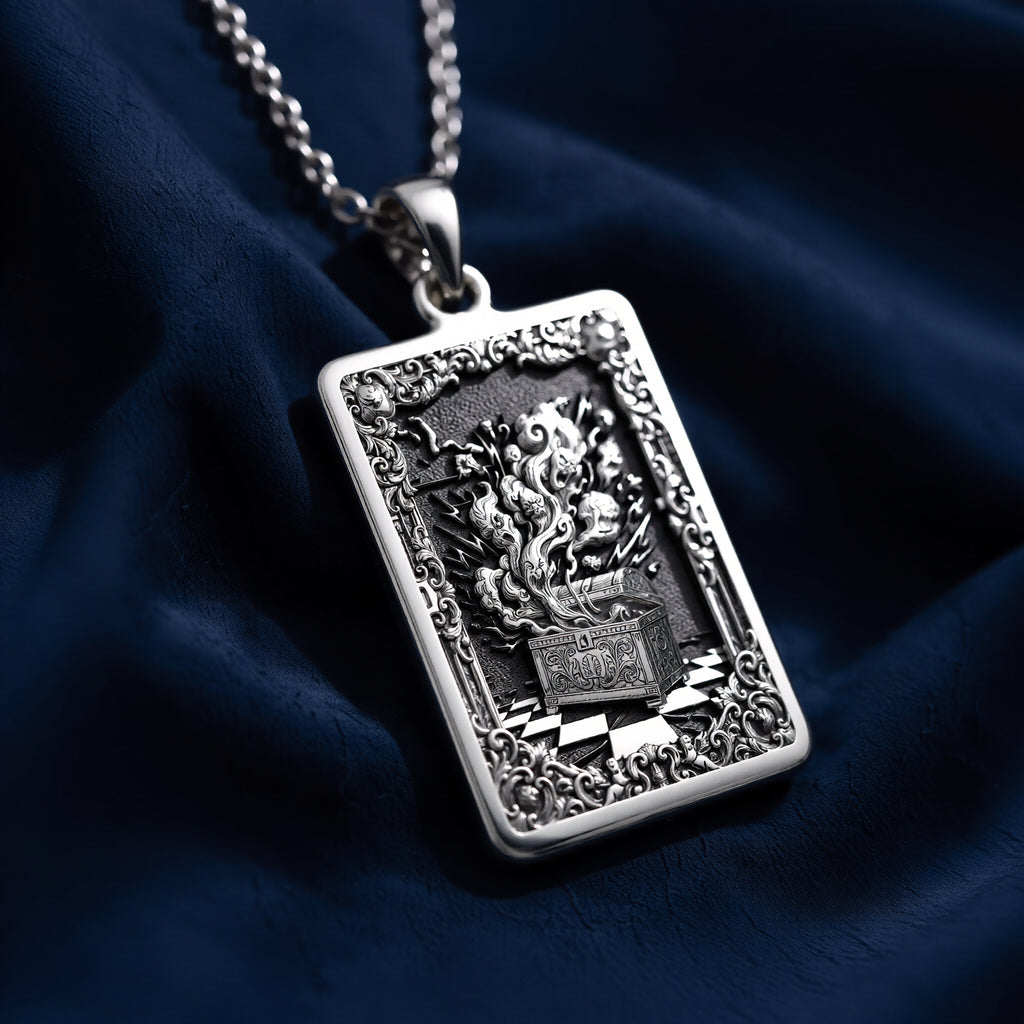 Silver rectangular pendant necklace featuring an ornate, detailed frame design with intricate scrollwork. The pendant is attached to a silver chain and displayed among faceted gemstones. - View 8