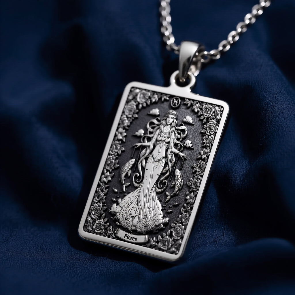 Silver pendant featuring a detailed design of the Pisces constellation, presented in a polished finish. The image shows a close-up view of the pendant, highlighting its intricate details and craftsmanship.