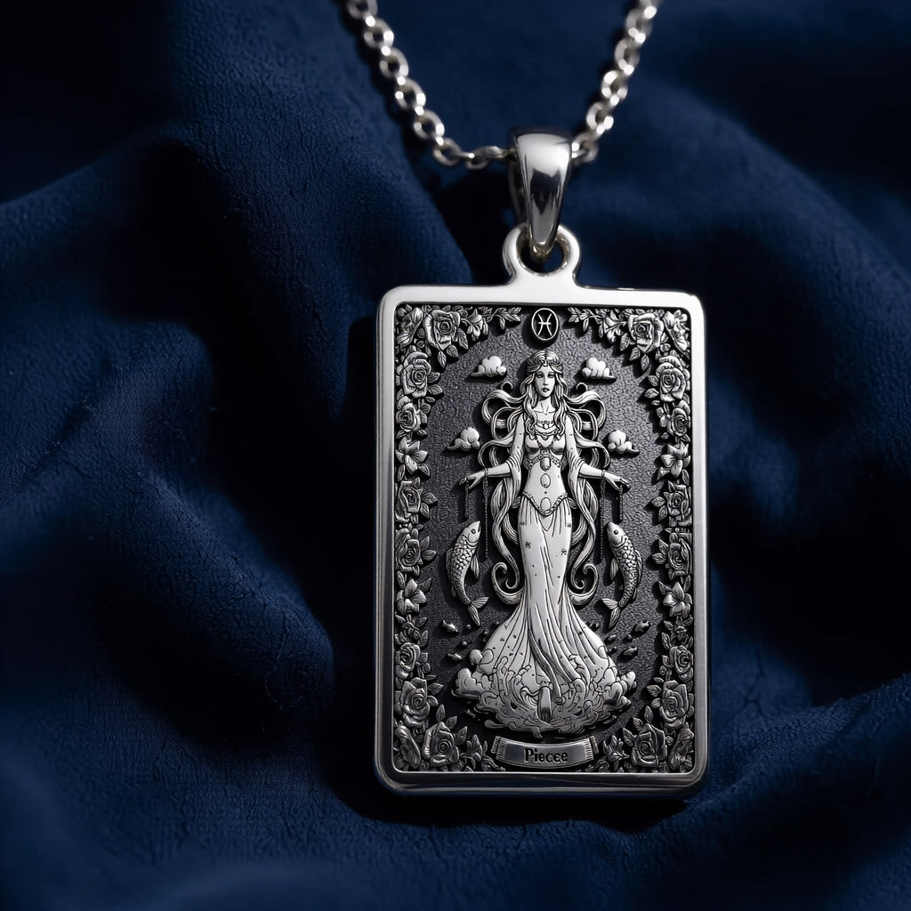 Silver plated rectangular pendant with fine detailing of a classical figure within an elaborate border. The necklace features a silver chain and is presented against a soft background. - View 5