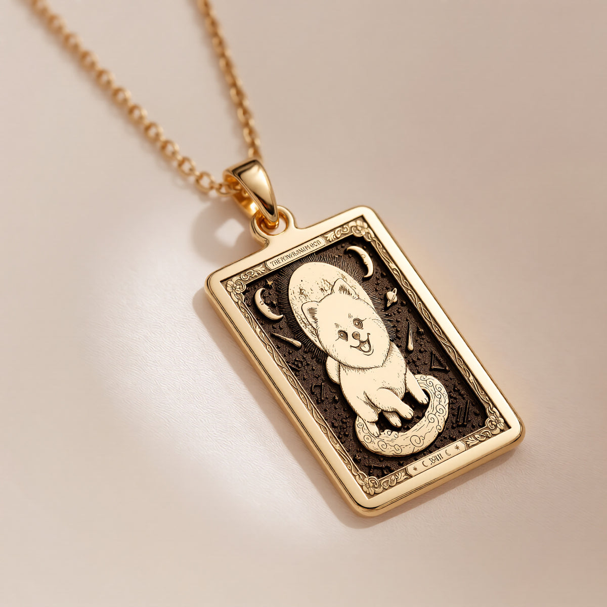 A polished 14K solid gold Pomeranian Boo medallion. This fine pet jewelry represents the breed's adorable charm, making it a perfect Pom lover gift.
