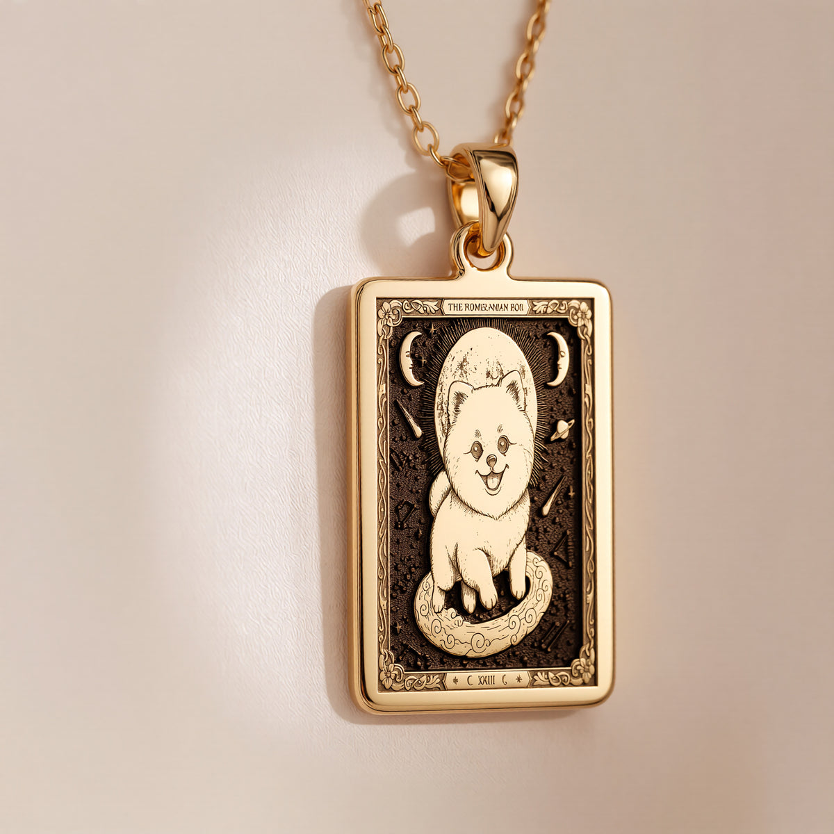 A polished 14K solid gold Pomeranian Boo medallion. This fine pet jewelry represents the breed's adorable charm, making it a perfect Pom lover gift.