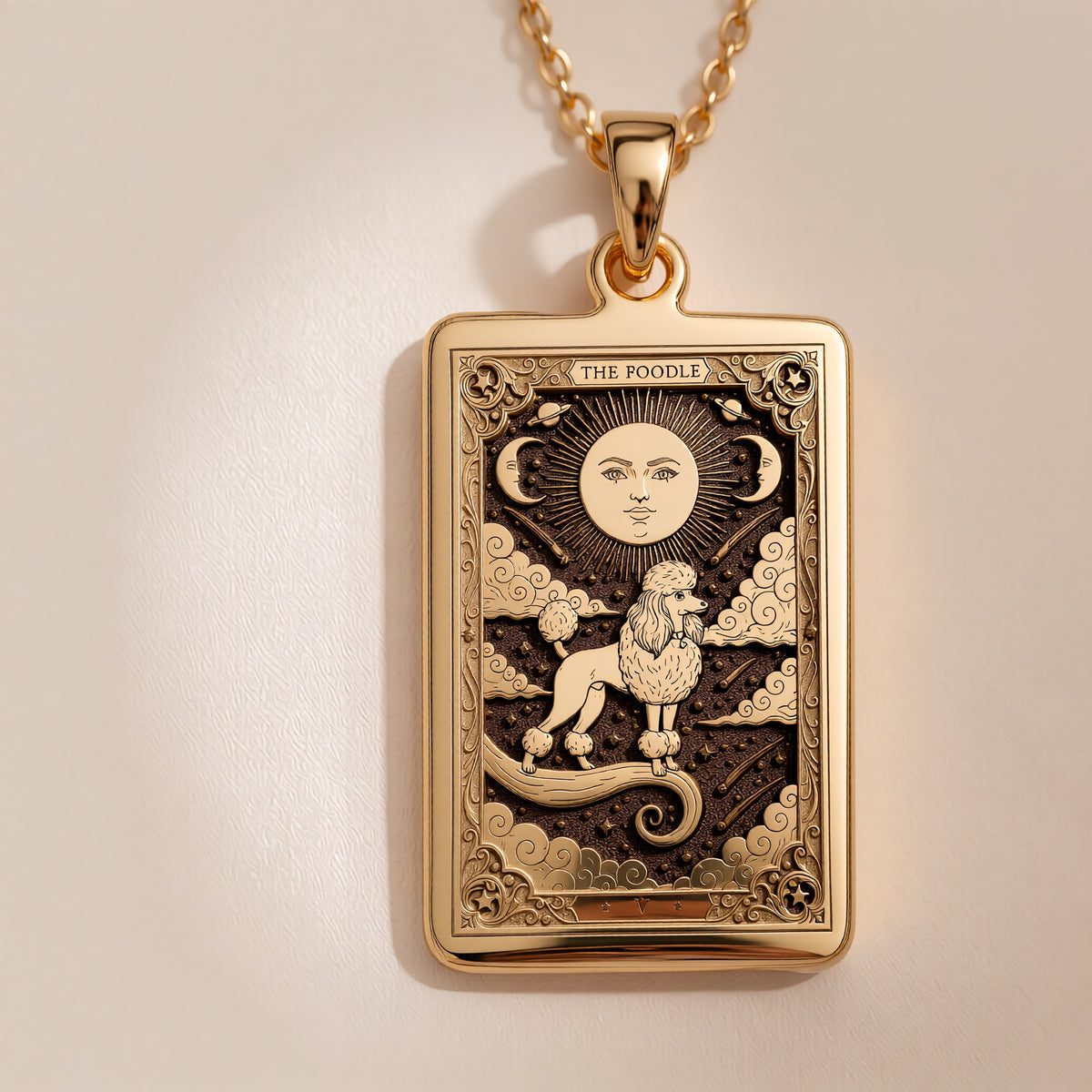 A polished 14K solid gold Poodle medallion. This fine pet jewelry represents the breed's intelligence and pride, making it a perfect Poodle lover gift.