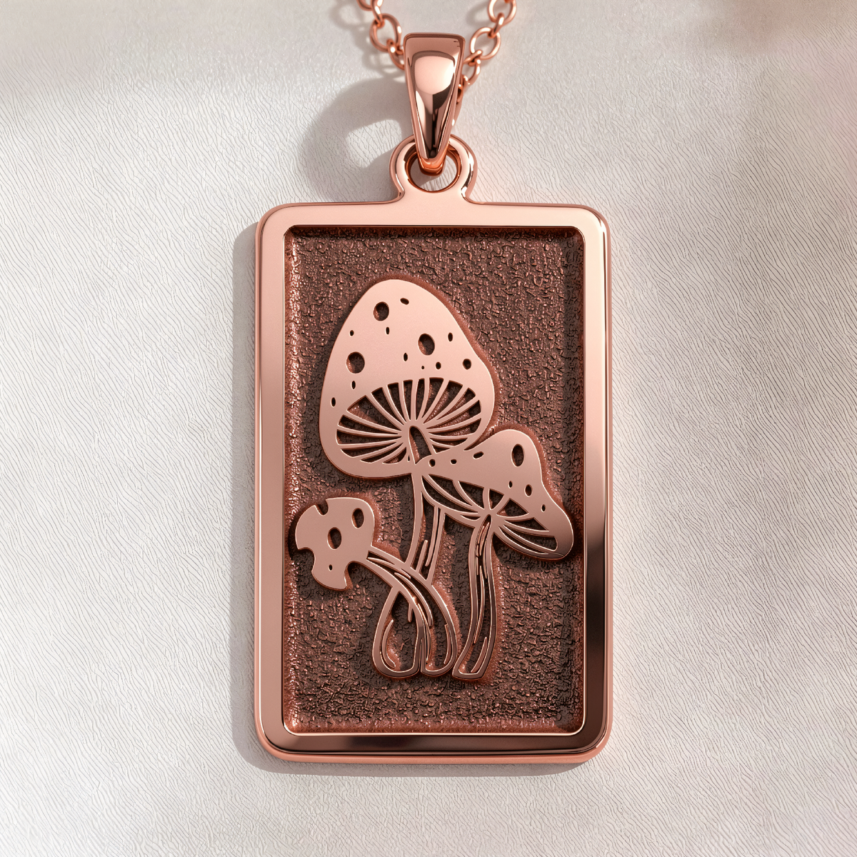 Psychedelic Mushroom Amulet Necklace in a polished rose gold finish.