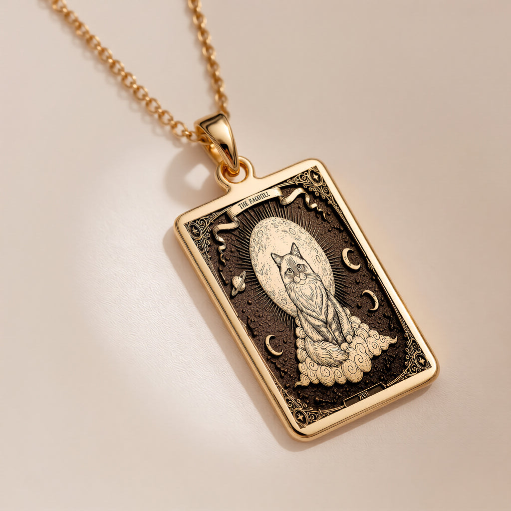 A polished 14K solid gold Ragdoll Cat medallion. This fine pet jewelry represents the breed's gentle nature, making it a perfect cat lover gift.