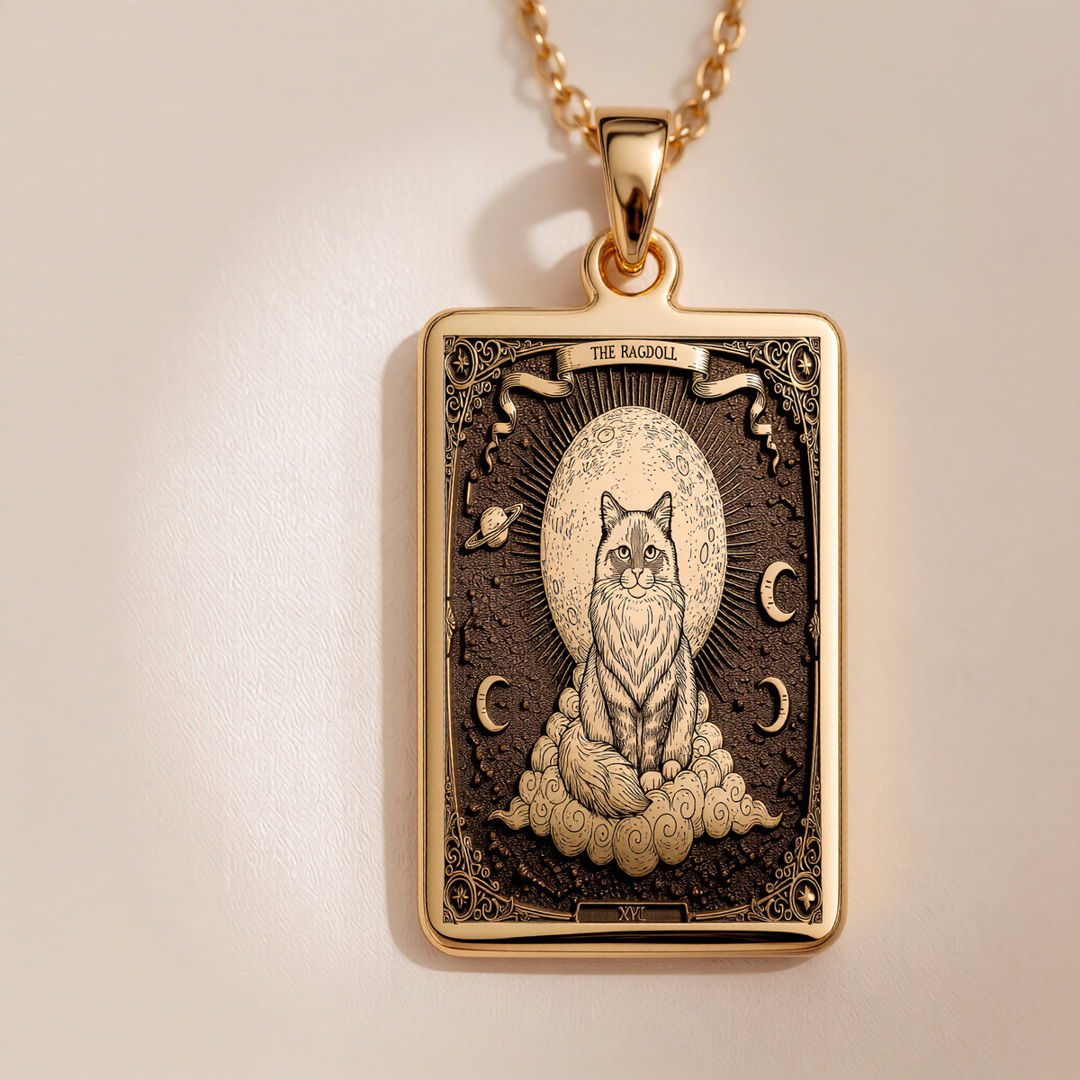 An heirloom-quality 14K solid gold Ragdoll Cat tarot pendant. The art shows the angelic cat on a cloud, symbolizing serenity, a precious cat mom gift.