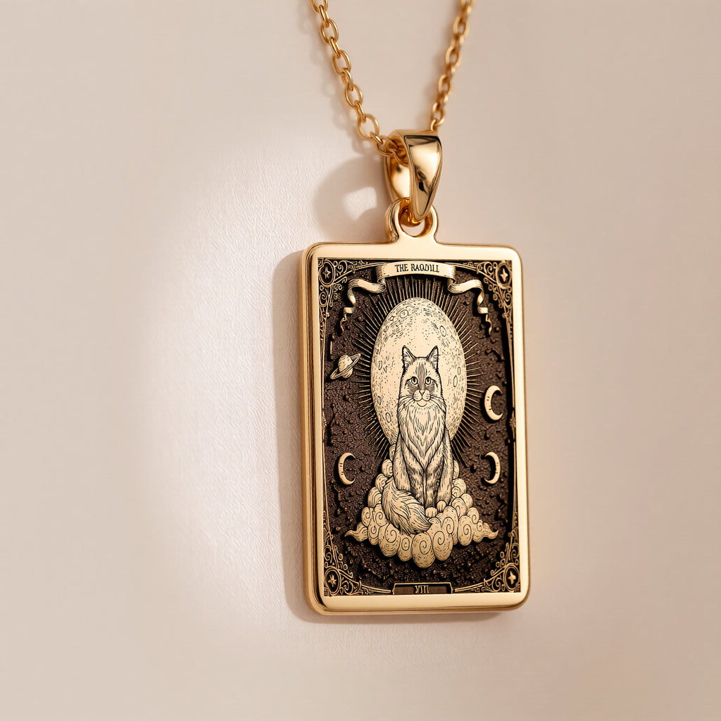A polished 14K solid gold Ragdoll Cat medallion. This fine pet jewelry represents the breed's gentle nature, making it a perfect cat lover gift.