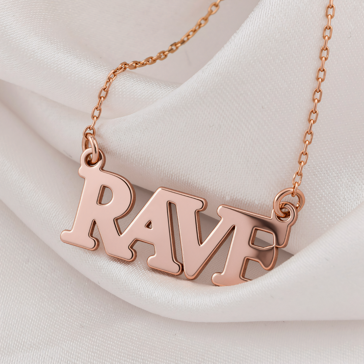 Rave Necklace Amulet in a polished rose gold finish.