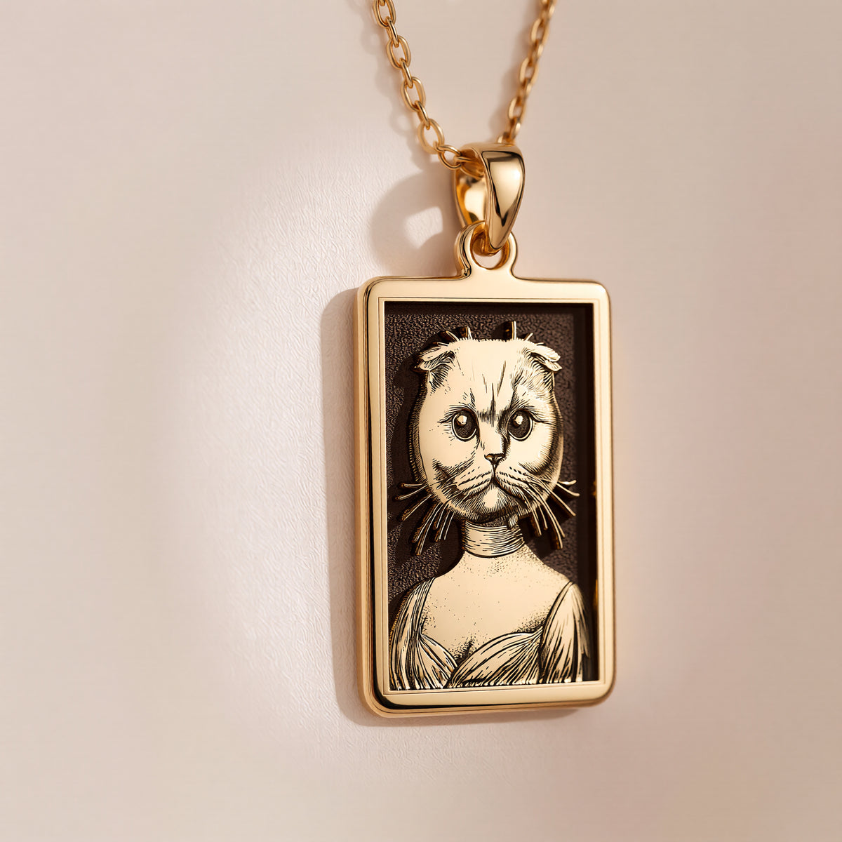 Product photo of a 14K Solid Gold Scottish Fold necklace from the 'Victorian Pet Collection'. The engraved cat is portrayed as a noble lady in a Regency-style dress.