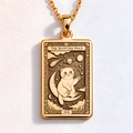 A polished 14K solid gold Scottish Fold medallion. This fine pet jewelry represents the breed's sweet spirit, making it a perfect cat lover gift.
