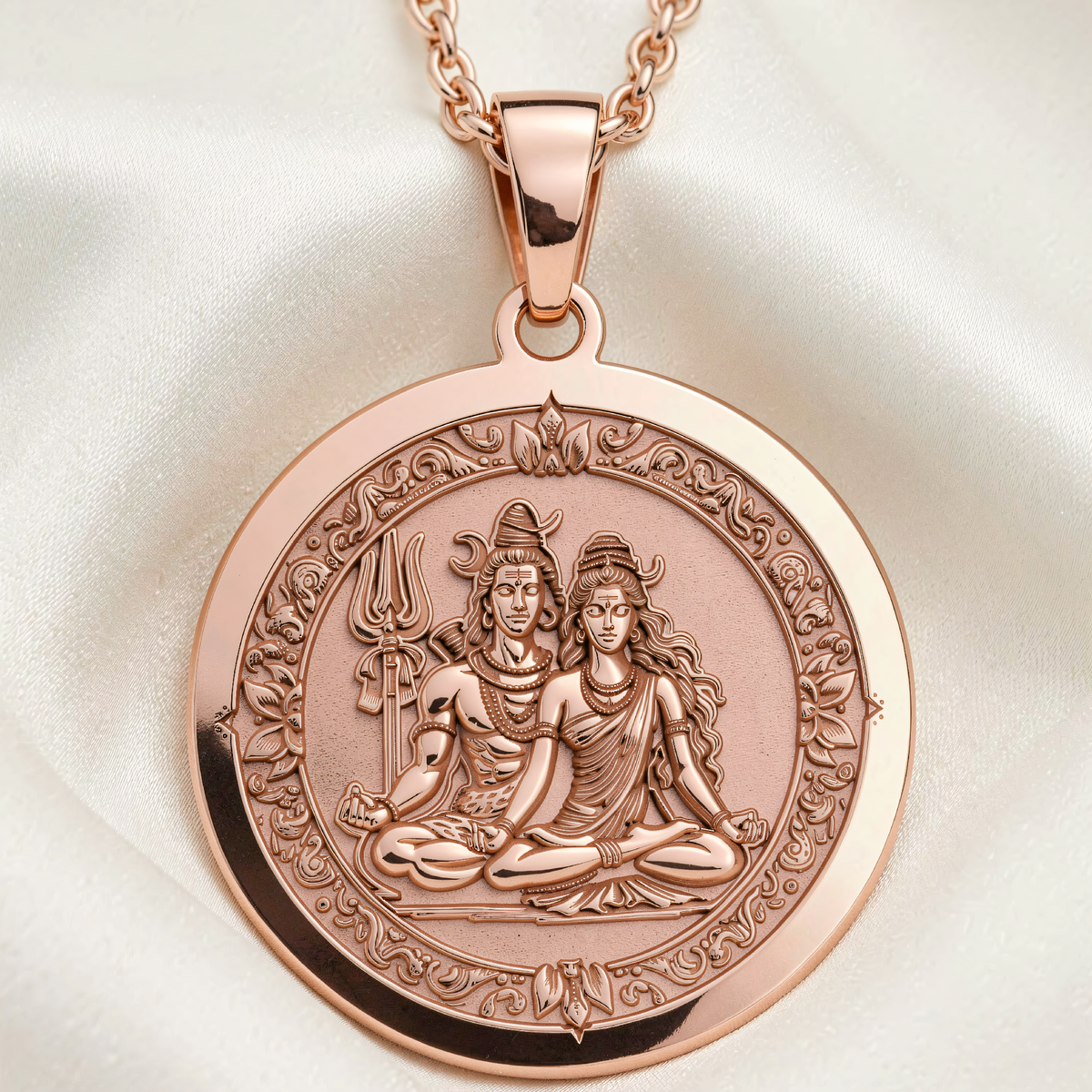 Shiva Parvati Couple Pendant in rose gold plated, front view of circular pendant with seated couple and trident motif.