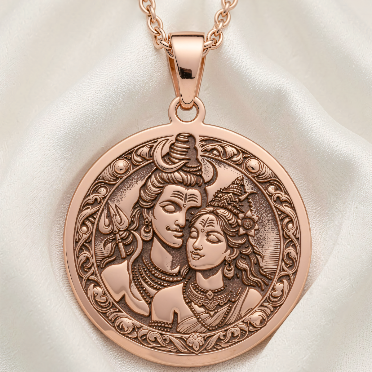 Shiva Parvati Trishul Necklace pendant in 14K rose gold plated finish, front view showing engraved couple and floral border.