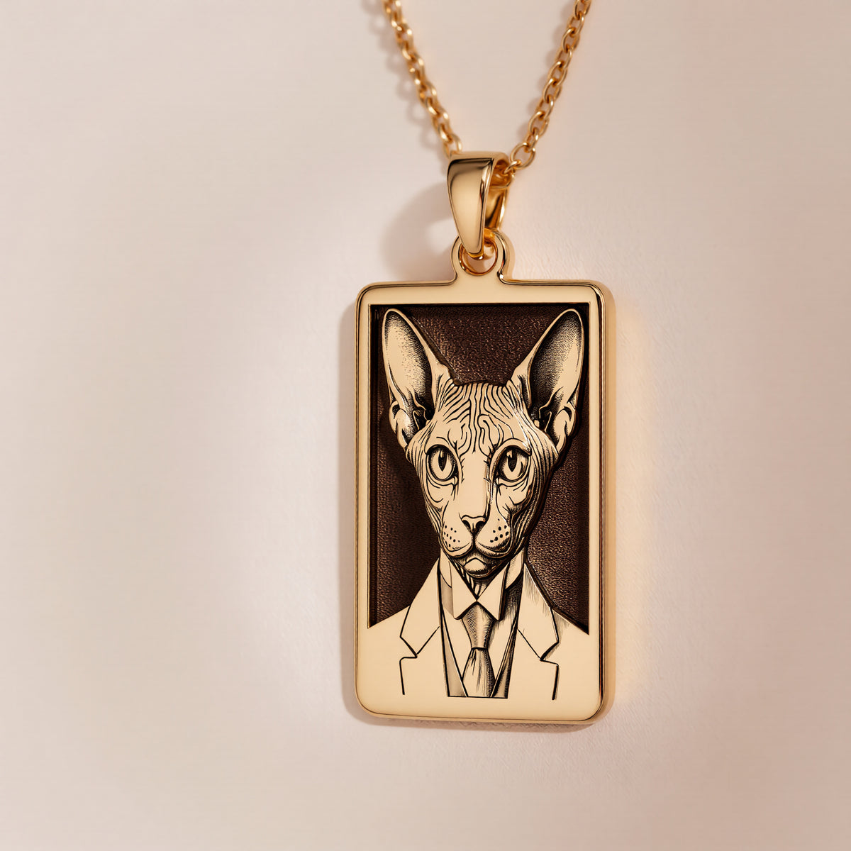 Heirloom quality 14K solid gold rectangular tag necklace, finely laser engraved with a dapper Sphynx cat in a suit for a personalized gift.