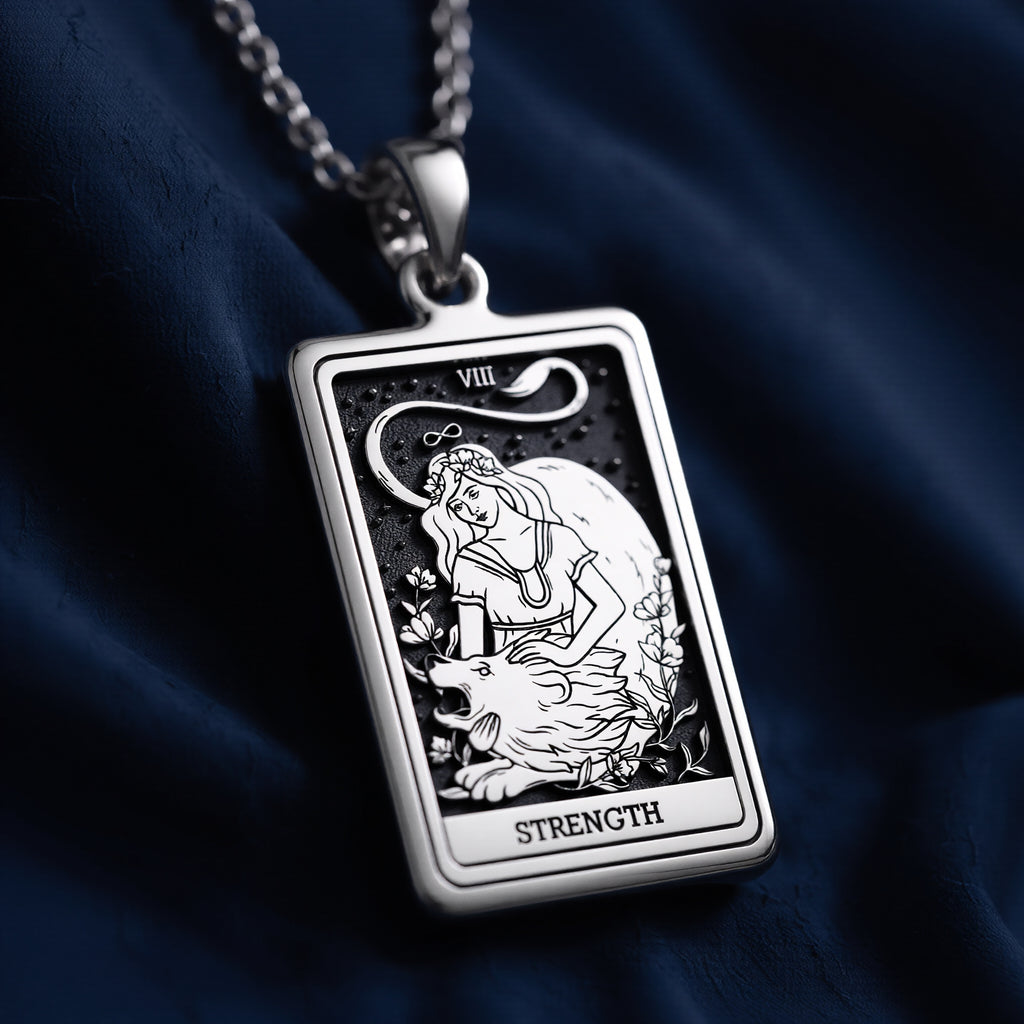Silver pendant necklace featuring a rectangular design of the Strength Tarot Arcana card with intricate line art. The pendant has a polished finish and is attached to a silver chain. - View 3