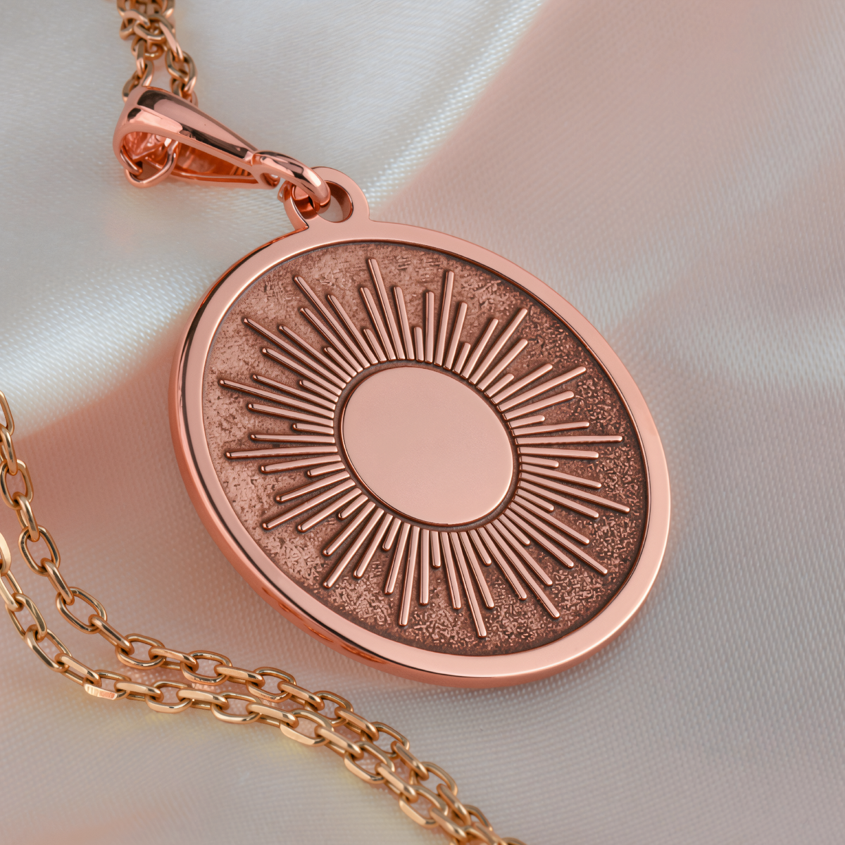 Sun Ray Celestial Pendant in a polished rose gold finish.