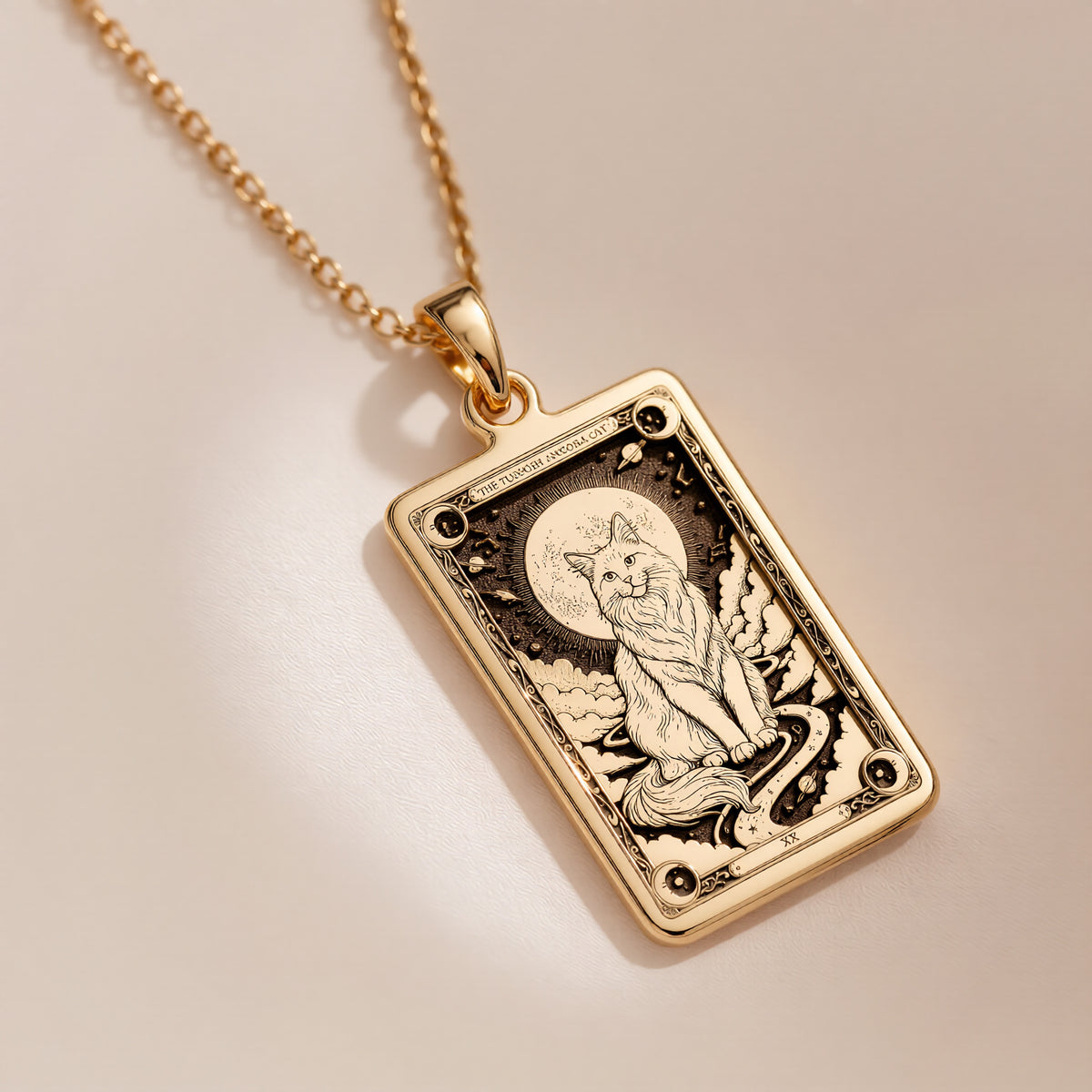 A polished 14K solid gold Turkish Angora medallion. This fine pet jewelry represents the breed's elegant nature, making it a perfect cat lover gift.
