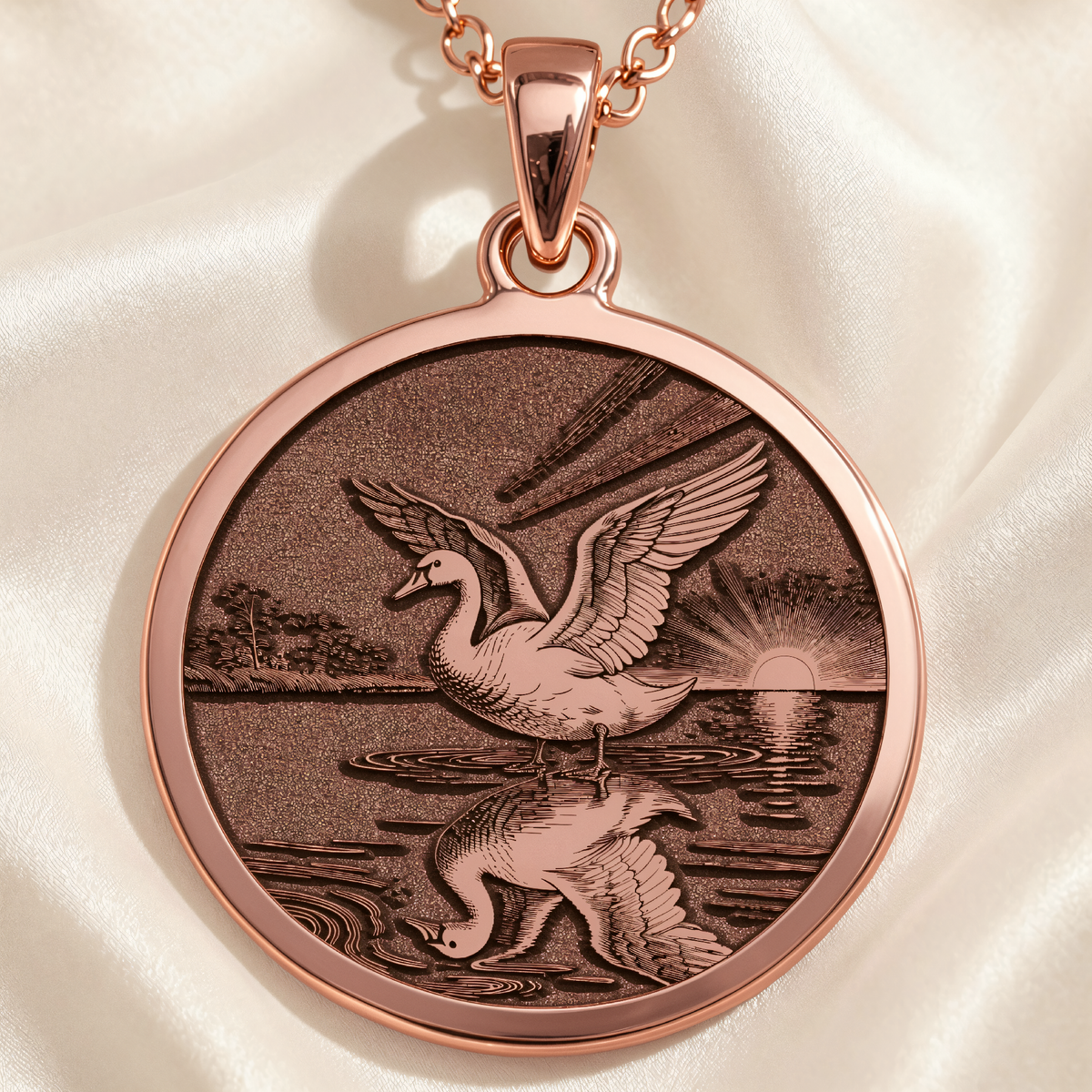 Ugly Duckling Swan Transformation Coin Pendant in a polished rose gold finish.