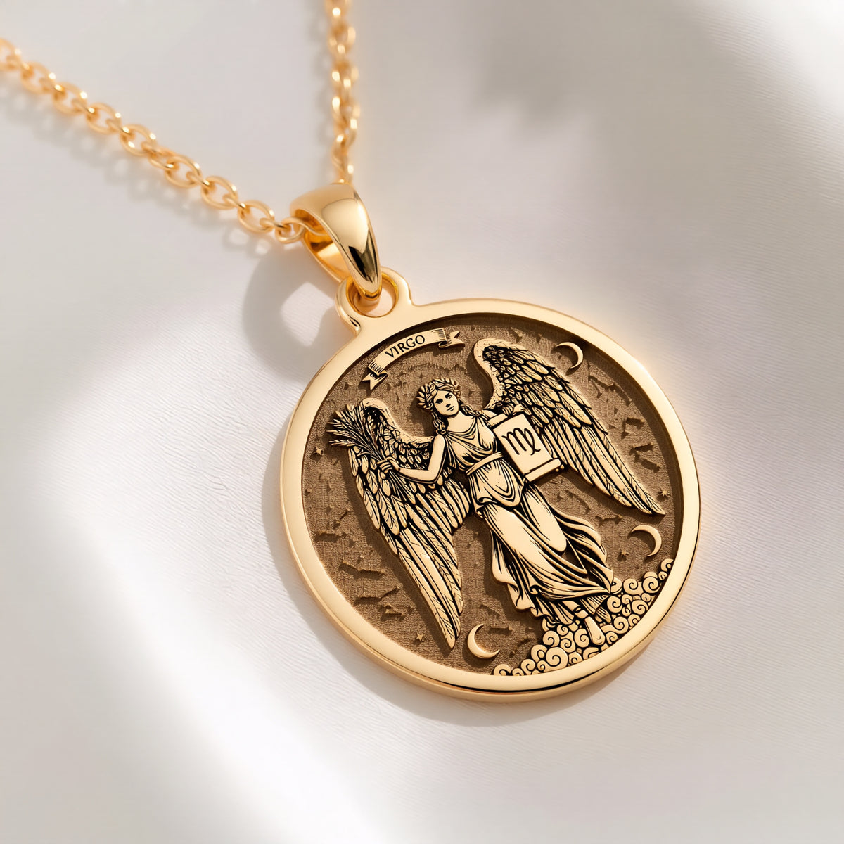 An heirloom-quality 14K solid gold round pendant engraved with a beautiful Virgo angel. This fine horoscope jewelry is a timeless symbol of the harvest season and purity.