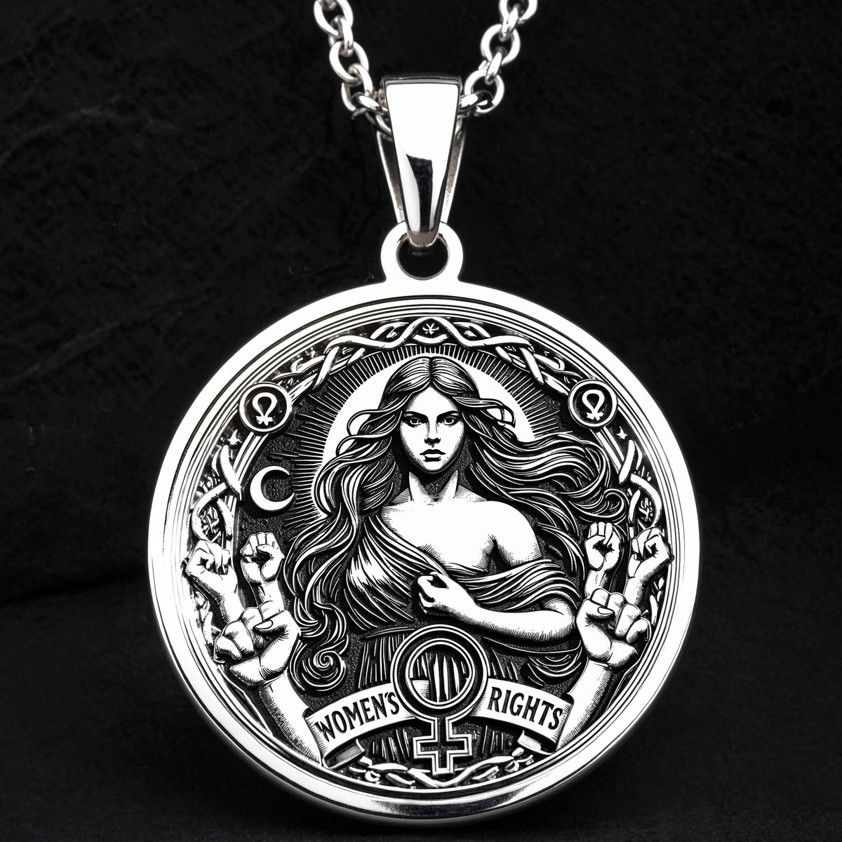 Intricately designed 925 Sterling Silver Women’s Rights medallion, featuring celestial details and a raised fist of strength. A perfect silver feminist necklace, representing equality and unity.